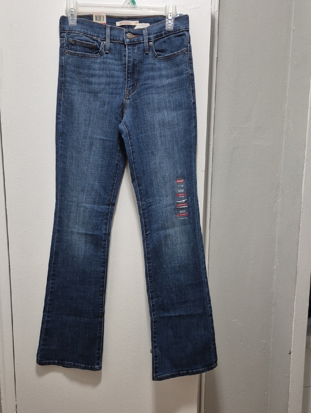 Levi's Dark Blue Flare Jeans with Subtle Distress